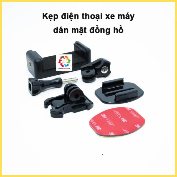 gia-kep-dien-thoai-xe-may-dan-len-mat-dong-ho-(2) Kẹp điện thoại dán lên mặt đồng hồ xe máy, có đế cài, dễ tháo lắp, kèm miếng dán 3M